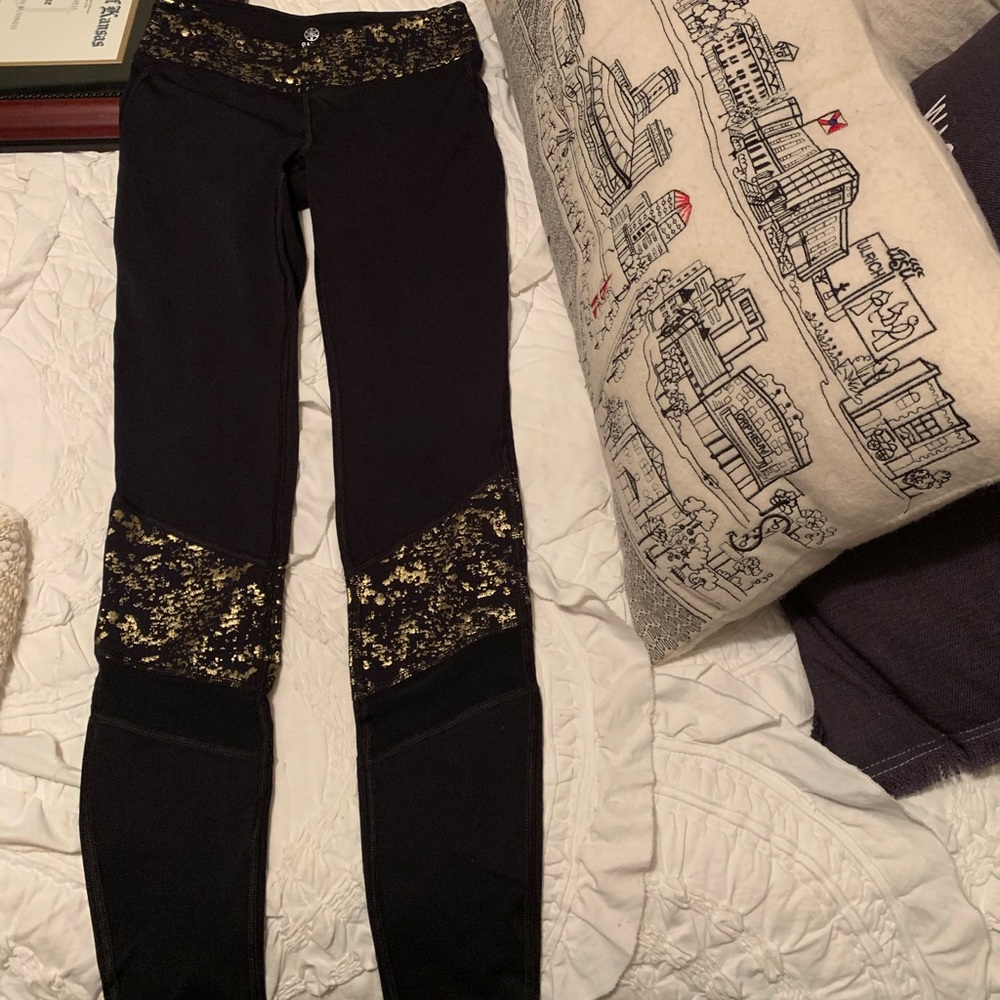 GAIAM black & gold with mesh leggings size small